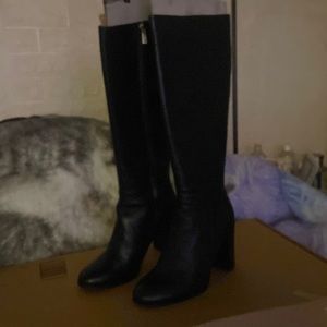 Kenneth Cole 9.5 Black Leather Boots,never worn,excellent boot,excellent brand.